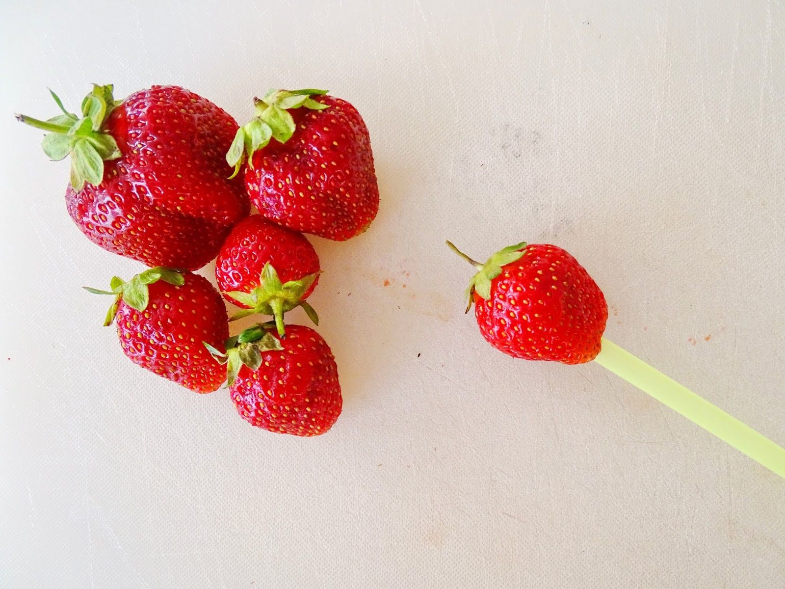 Put Your Knives Away And Hull Strawberries With a Straw Forkly